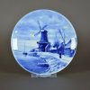 Wandbord Delft blauw met windmolen in winterlandschap naar Louis Apol
