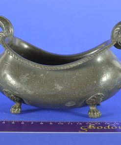 Jardinière van tin op leeuwenvoetjes