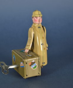 Speelgoed metaal man met koffer