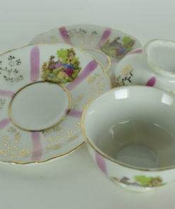 Kleine kop en schotel porselein