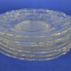 Schotels kleurloos glas met bloem- of schelpmotief