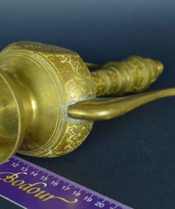 Arabische koperen schenkkan