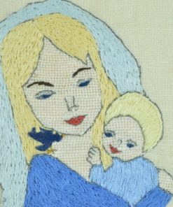 Borduurwerk van een vrouw met kind