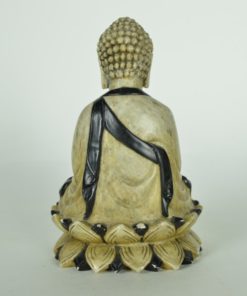 Boeddha van speksteen met zwarte bal