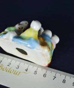 Lachende Boeddha met kinderen klein porselein