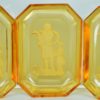 Zoutbakjes van amberkleurig intaglio glas