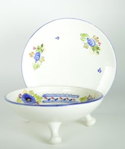 Fruittest wit aardewerk met blauwe bloem