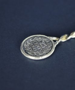 Zilveren theelepel van munten