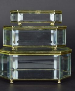 Drie doosjes van kristal met bloemen