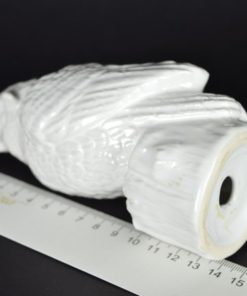 Uil van wit porselein