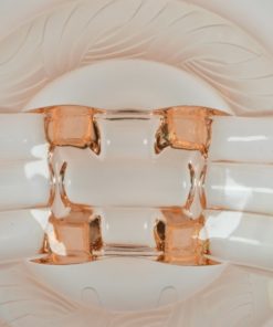 Fruitschaal roze glas op vier voetjes