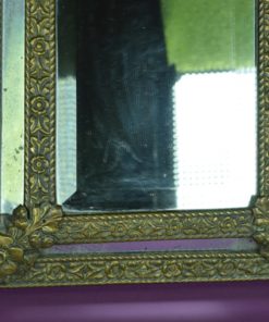 Spiegel met lijst van koper