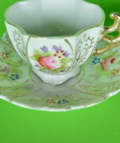 Set van 2 romantische mini kop en schotels - porselein