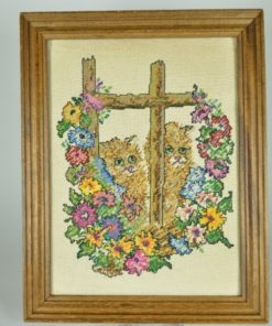 Borduurwerk met poezen