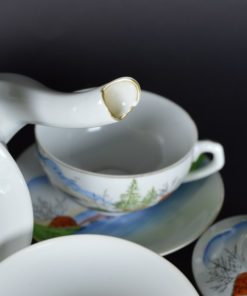Theepot met 2 kop- en schotels met Geisha gezichtje - porselein