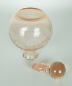 Fles met stop en guirlandes - roze glas