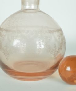 Fles met stop en guirlandes - roze glas