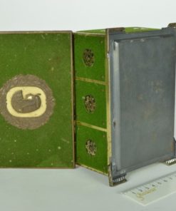 Blik met antiek Egyptisch hoofd 1920 - groen fluweel