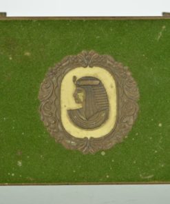 Blik met antiek Egyptisch hoofd 1920 - groen fluweel