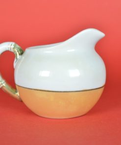 Schenkkan met vogel en parelmoerglazuur - porselein