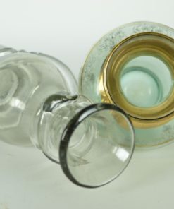 Twee vaasjes turquoise en grijs glas met glazen lint en gouden accenten