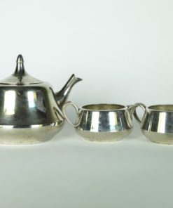 Theepot met melkkan en suikerpot - verzilverd metaal