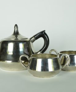 Theepot met melkkan en suikerpot - verzilverd metaal