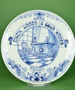 Wandbord Eigen Haard is Goud waard - blauw op wit aardewerk